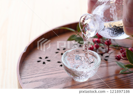 Image of Japanese sake (pouring cold sake) 121897186