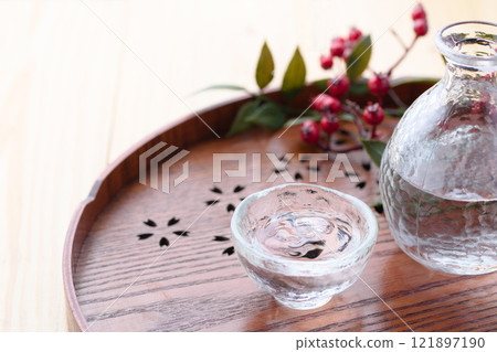 Image of Japanese sake (pouring cold sake) Image of Japanese sake (pouring cold sake) 121897190