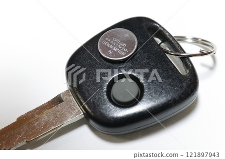 Car keys and button battery Car keys and button battery 121897943
