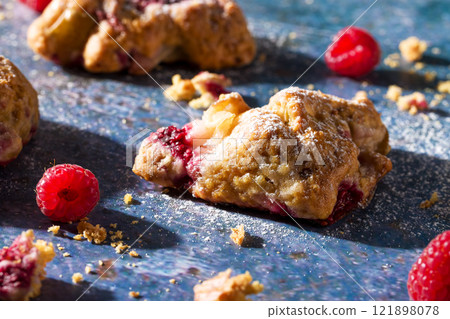 Pear and raspberry scones. Fresh pastries 121898078