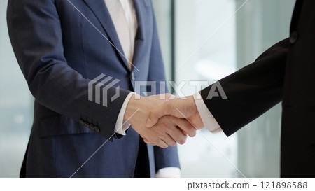 A businessman shaking hands A businessman shaking hands 121898588