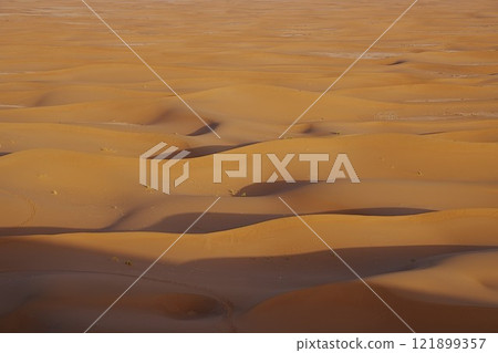 Area of sand formations of Erg Chigaga dune at Sahara desert in southeastern MOROCCO 121899357