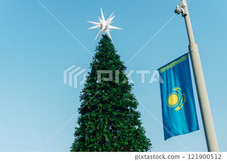 the Kazakh flag in a public place. the real Kazakh flag in the city 121900512