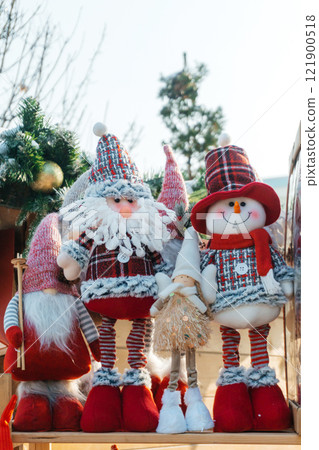 New Year's toys at the fair in the city. soft Christmas toys under the Christmas tree New Year's toys at the fair in the city. soft Christmas toys under the Christmas tree 121900518