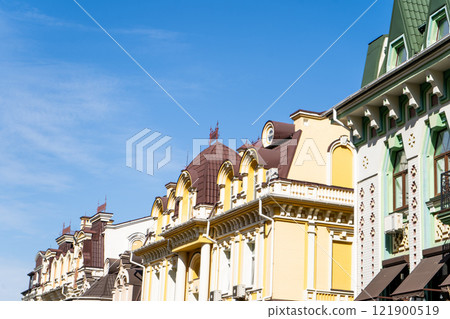 Facade of colorful house. Residential buildings. Bright windows. Balcony modern architecture. 121900519