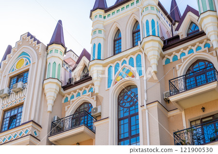Facade of Colorful House. Residential buildings. Bright windows. Balcony modern architecture. Facade of Colorful House. Residential buildings. Bright windows. Balcony modern architecture. 121900530