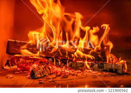 Fire burning in the kiln 121900562