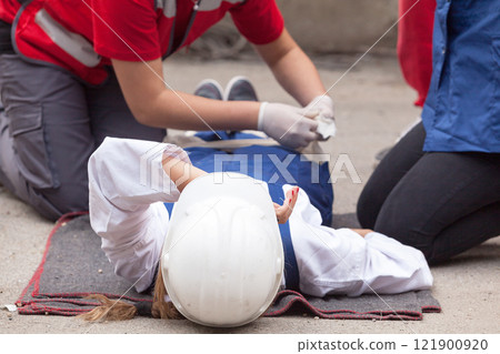 First aid after work accident 121900920