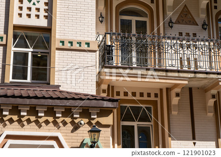 Open balcony with forged bars and railings. Terrace of the house 121901023