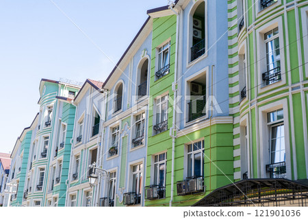 Multicolor modern exterior of Houses Buildings. Bright windows Multicolor modern exterior of Houses Buildings. Bright windows 121901036
