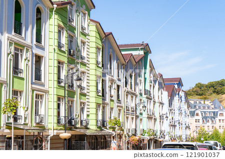 Multicolor modern exterior of Houses Buildings. Bright windows Multicolor modern exterior of Houses Buildings. Bright windows 121901037