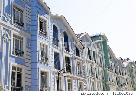 Blue color modern exterior of Houses Buildings. Bright windows Blue color modern exterior of Houses Buildings. Bright windows 121901056