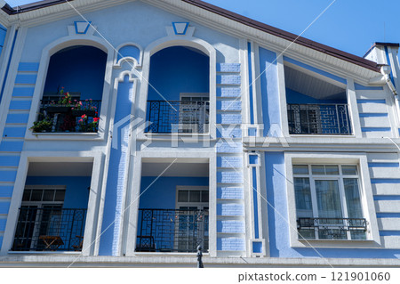 Blue color modern exterior of Houses Buildings. Bright windows 121901060