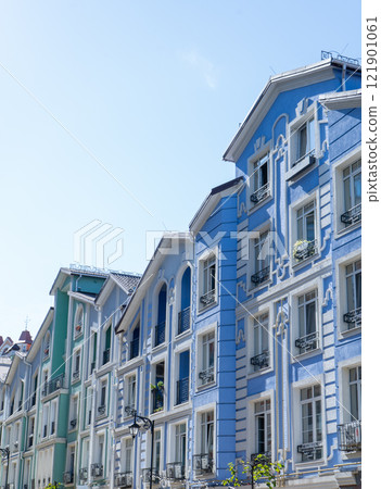 Blue color modern exterior of Houses Buildings. Bright windows 121901061