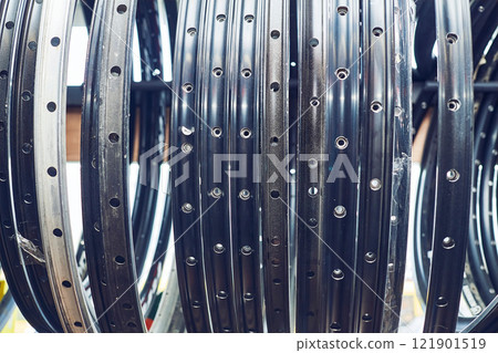Repair shop.Metal rims of hanging bicycle wheels hanging 121901519
