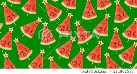 Watermelon background. Watermelon slices on a stick with a star from an apple top view. Fruit pattern. Banner. Christmas tree made of food. Summer Christmas 121901555