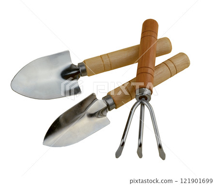 Gardening tools set isolated on white background. Two shovels and a rake for gardening. Herringbone for indoor plants and flowers. Tools with wooden handles. Small shovel. Gardener's tool. Gardening tools set isolated on white background. Two shovels and a rake for gardening. Herringbone for indoor plants and flowers. Tools with wooden handles. Small shovel. Gardener's tool. 121901699