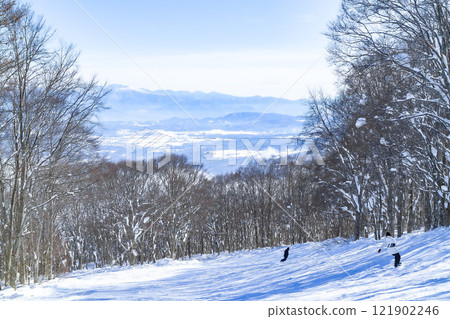 A ski resort on a sunny day 121902246