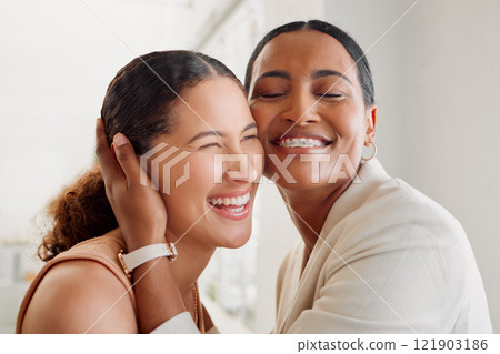 Female empowerment, support and unity with colleagues, creative women and fun coworkers. Headshot and faces of smiling, happy and proud manager hugging, embracing and congratulating employee success Female empowerment, support and unity with colleagues, creative women and fun coworkers. Headshot and faces of smiling, happy and proud manager hugging, embracing and congratulating employee success 121903186