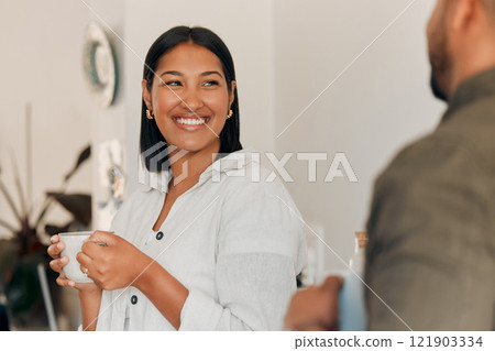 Woman drinking coffee, having conversation and bonding with her husband at home. Smiling, happy and relaxed wife enjoying quality time, romantic and peaceful moment as a couple in loving relationship 121903334