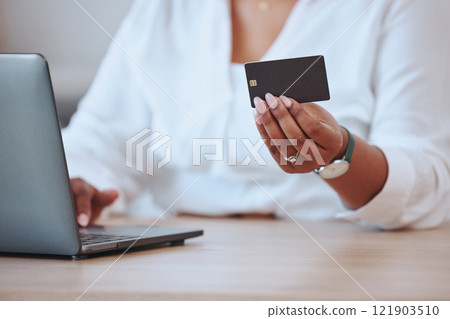 Credit card, laptop and finance with a businesswoman paying her bills and mortgage online. Black woman ordering, hands and banking as she saves money in her bank account for a budget or loan. Credit card, laptop and finance with a businesswoman paying her bills and mortgage online. Black woman ordering, hands and banking as she saves money in her bank account for a budget or loan. 121903510