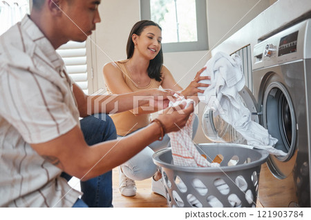 Chores, couple laundry and washing machine during routine washing, cleaning and housework at home. Man and woman bonding, cleaning and maintaining personal hygiene with household appliance and dryer Chores, couple laundry and washing machine during routine washing, cleaning and housework at home. Man and woman bonding, cleaning and maintaining personal hygiene with household appliance and dryer 121903784
