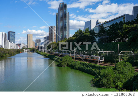 Chuo Line Rapid train running along the outer moat Chuo Line Rapid train running along the outer moat 121905368