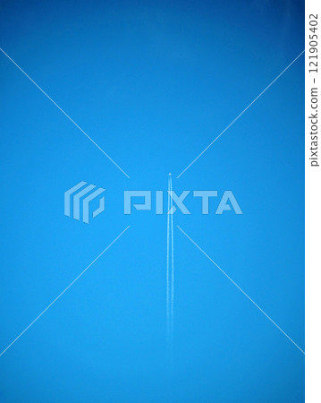 A blue sky with an aircraft 121905402