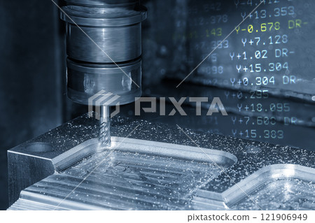 Abstract scene the CNC milling machine cutting mold part and G-code data back ground. 121906949