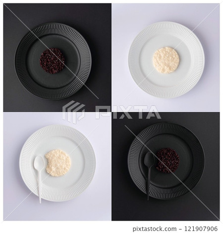 Checkerboard design made of black and white plates Checkerboard design made of black and white plates 121907906