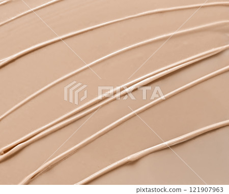 Smeared texture of BB face cream, tonal foundation is smudged. 121907963