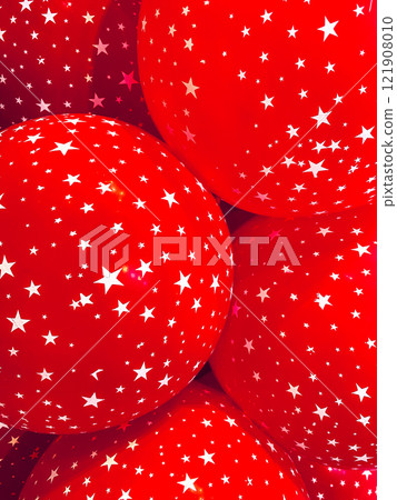 Festive Red Balloons with Starry Patterns Radiating Joy and Celebration Festive Red Balloons with Starry Patterns Radiating Joy and Celebration 121908010