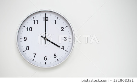 Minimalist White Clock with Silver Frame Striking 16.00/04.00 on White Background. Perfect for Time Management and Corporate Campaigns 121908381