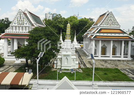 White Buddhism Church and Pagoda at Wat Nang Chee Chotikaram has an ordination hall without the raka's leaf chorfa and swan's tail, which are royal art styles popular in the reign of King Rama III.  121908577