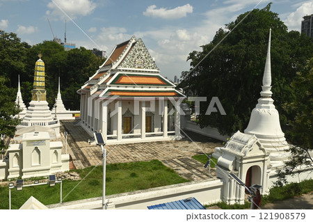 White Buddhism Church and Pagoda at Wat Nang Chee Chotikaram has an ordination hall without the raka's leaf chorfa and swan's tail, which are royal art styles popular in the reign of King Rama III.  121908579