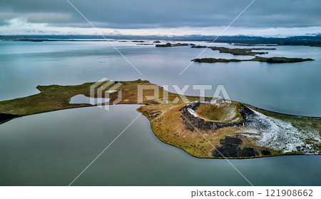 Volcanoes and the calm waters around Lake Mývatn Volcanoes and the calm waters around Lake Mývatn 121908662
