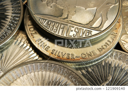 Close-up of pure silver coins. Investments in precious metals Close-up of pure silver coins. Investments in precious metals 121909140