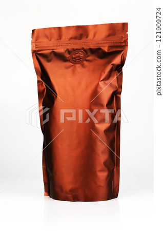Vacuum packaging of coffee isolated on white background. Coffee pack mockup with place for text. Brown zippo bag for storing grains and food Vacuum packaging of coffee isolated on white background. Coffee pack mockup with place for text. Brown zippo bag for storing grains and food 121909724