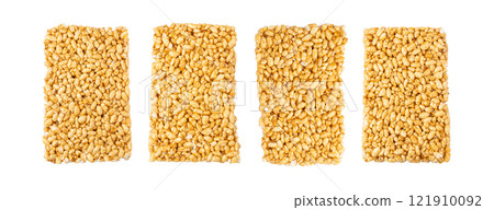 Puffed rice bar isolated, sweet wheat kozinaki, puff cereal block pieces, sugar crispy wheat bar, healthy popped dessert 121910092
