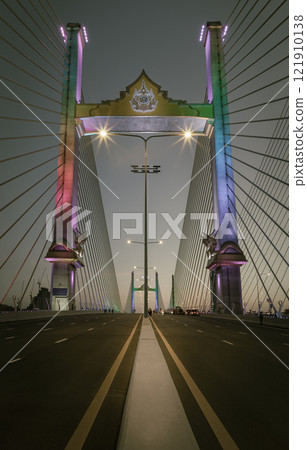 Stunning scenery of Thotsamarachan Bridge or King Rama X Bridge crossing Chao phraya river with evening sky. 121910138