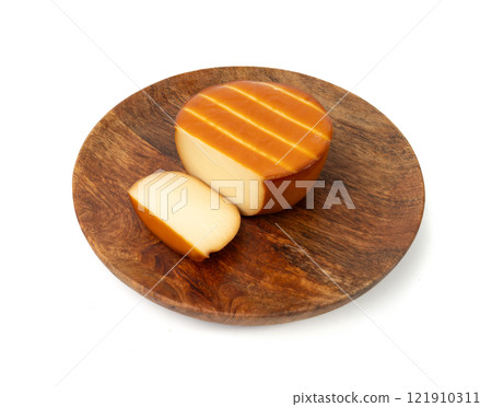 Smoked Round Cheese Isolated, Camel Milk Cheese, Mountain Snack, Sheep Milk Product on White Smoked Round Cheese Isolated, Camel Milk Cheese, Mountain Snack, Sheep Milk Product on White 121910311