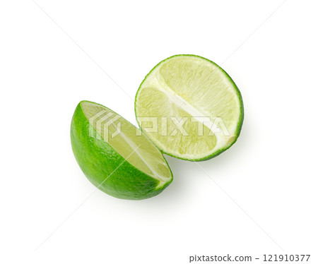 Squeezed lime isolated, squeezed out half green lemon on white background, burnout symbol 121910377