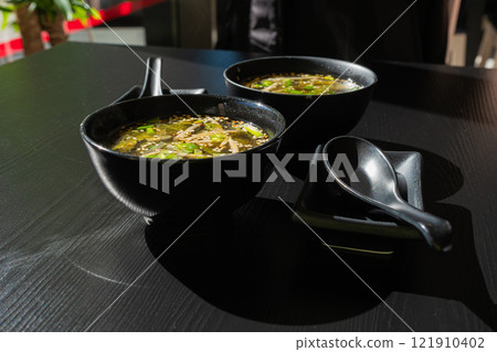 Fish Broth with Greens, Sesame Seeds and Herbs Fish Broth with Greens, Sesame Seeds and Herbs 121910402
