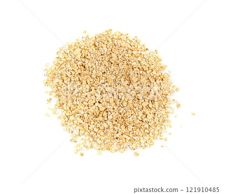 Dry raw oat flakes isolated, rolled flat grains, instant porridge, thin cereals, flattened grains group 121910485