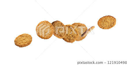 Falling oatmeal cookies or healthy cereal oat crackers with chocolate. Crispy flying anzac biscuit 121910498