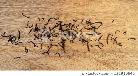 Flavored Black Tea Leaves Scattered Texture, High Quality Black Tea Pile with Fruits and Flowers, Dry Tea 121910646