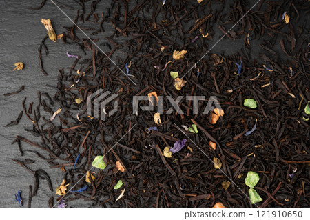 Flavored Black Tea Leaves Pile Texture, High Quality Black Tea Pile with Fruits and Flowers, Dry Tea Leaves 121910650