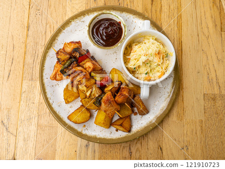 Poultry Shish Kebab, Barbecue Shashlik with Meat and Vegetables, Fruits, Peppers, Onions and Pineapple Poultry Shish Kebab, Barbecue Shashlik with Meat and Vegetables, Fruits, Peppers, Onions and Pineapple 121910723