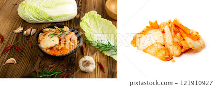Kimchee in black bowl on wood table. Spicy kim chi pile, hot fermented napa cabbage, traditional jimchi Kimchee in black bowl on wood table. Spicy kim chi pile, hot fermented napa cabbage, traditional jimchi 121910927