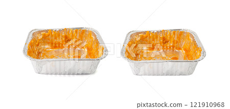 Empty aluminium foil tray isolated, lasagne food remains in dirty packaging for heating, food waste Empty aluminium foil tray isolated, lasagne food remains in dirty packaging for heating, food waste 121910968